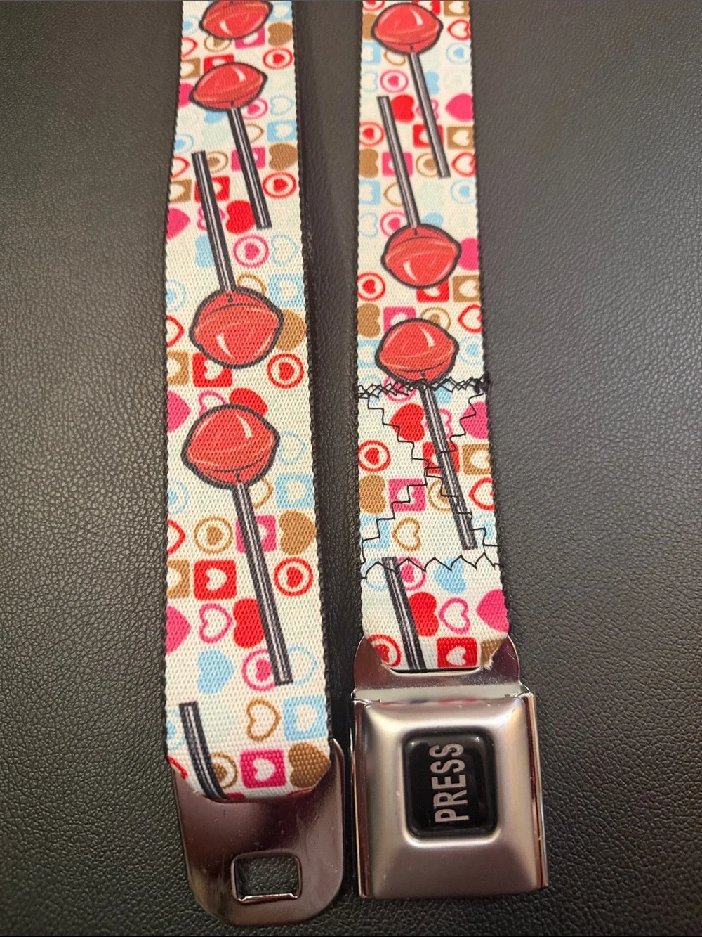 Buckle-Down Heart & Lollipop Seatbelt Belt - Red, Pink, Blue, Brown